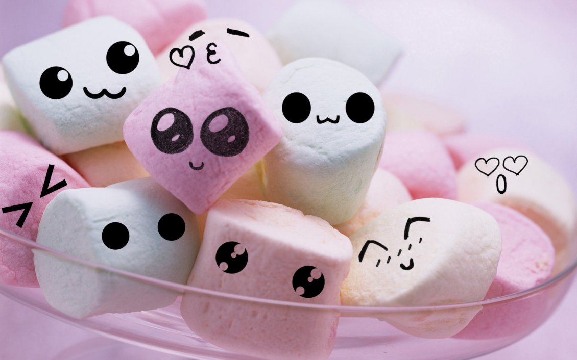 Cute and funny faces on marshmallows